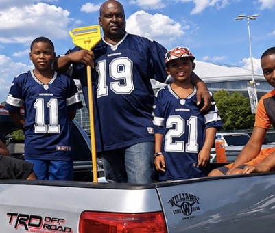 Dallas Cowboys jerseys in the back of a truck