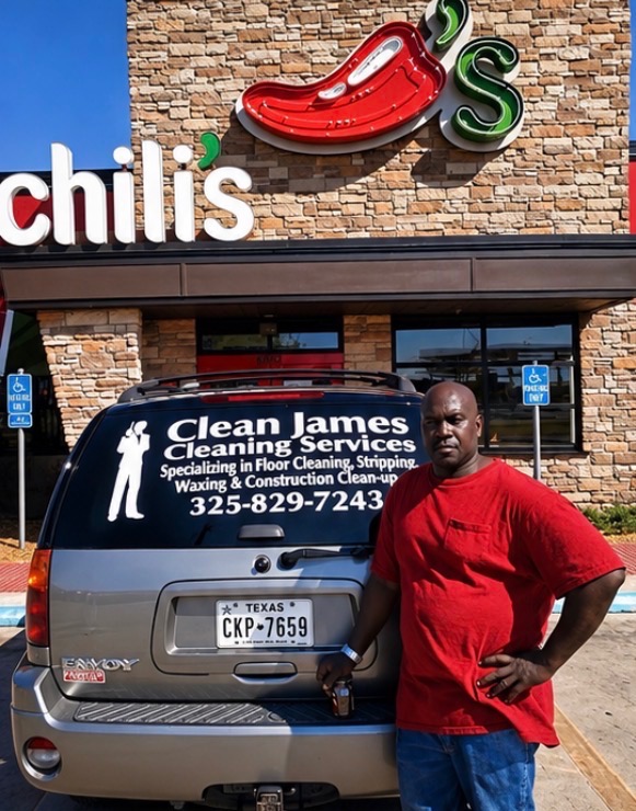 The Clean James Cleaning Services vehicle parked outside a restaurant